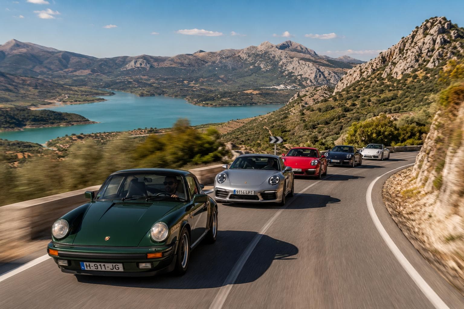 Cinematic convoy driving through Andalusian mountain roads at sunset
